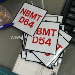 สติ๊กเกอร์สกรีนข้อความ "NBMT D01-D80" ขนาด 10 x 10 เซนติเมตร