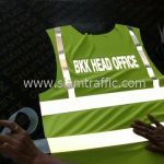 เสื้อสะท้อนแสงจราจร ปตท. รีดข้อความสะท้อนแสง "BKK HEAD OFFICE"