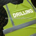 เสื้อสะท้อนแสงสีเขียว ปตท. รีดข้อความสะท้อนแสง "DRILLING