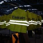 ขายเสื้อกันฝน สกรีนข้อความ Emirates