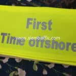 ปลอกแขนความปลอดภัย สีเขียวตองอ่อน รีดข้อความ "First Time Offshore"